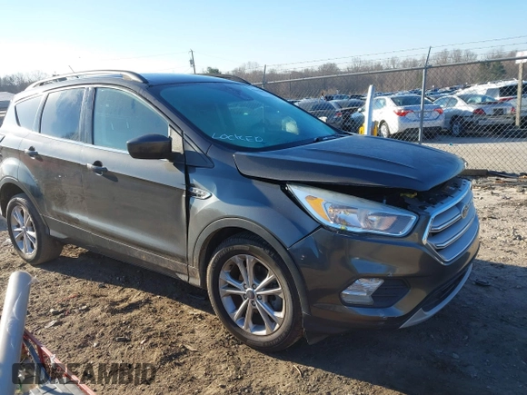 2018 Ford Escape SE with VIN 1FMCU0GD0JUA87303, listed as a IAAI auction lot 41612502 with 70,233 mi miles. Bid and sale history available at carsss.com. Image 1.