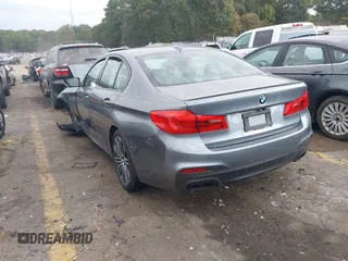 2018 BMW 5 Series M550i xDrive with VIN WBAJB9C53JB286035, listed as a IAAI auction lot 40590380 with 57,072 mi miles and . Bid and sale history available at carsss.com. Image 3.
