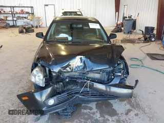 2007 Kia Optima EX with VIN KNAGE124875134352, listed as a IAAI auction lot 41627381 with 183,053 mi miles. Bid and sale history available at carsss.com. Image 6.