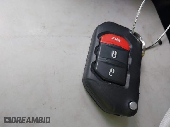 2020 Jeep Wrangler Unlimited Black and Tan с VIN 1C4HJXDG3LW266615, выставлен на аукционе IAAI как лот 42207899 с пробегом 55 291 миль миль и . История ставок и продаж доступна на DreamBid. Изображение 11.
