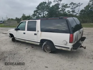 1997 GMC Suburban with VIN 1GKEC16R9VJ728883, listed as a Copart auction lot 52104265 with 246,816 mi miles and Salvage Title. Bid and sale history available at carsss.com. Image 2.