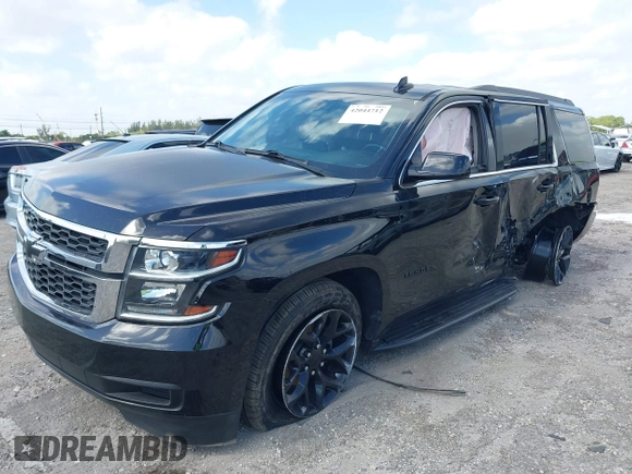2017 Chevrolet Tahoe LS with VIN 1GNSCAKC1HR225698, listed as a IAAI auction lot 42044712 with 89,605 mi miles and . Bid and sale history available at DreamBid. Image 2.