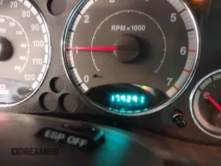 2007 Jeep Liberty Limited z VIN 1J4GL58K87W508744, wystawiony jako IAAI lot #40986728 z przebiegiem 179 291 mil mil oraz . Historia ofert i sprzedaży dostępna na DreamBid. Obrazek 15.