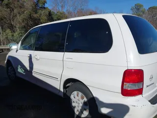 2005 Kia Sedona LX with VIN KNDUP132956703200, listed as a IAAI auction lot 41700159 with 125,578 mi miles. Bid and sale history available at carsss.com. Image 14.