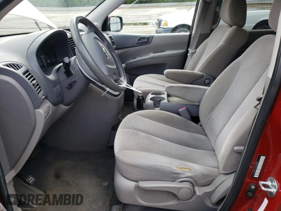 2010 Kia Sedona LX with VIN KNDMG4C32A6346589, listed as a Copart auction lot 53001474 with 139,923 mi miles and Salvage Title. Bid and sale history available at carsss.com. Image 7.