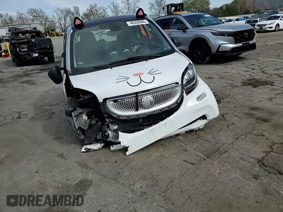 2016 Smart fortwo Passion z VIN WMEFJ5DA4GK141225, wystawiony jako Copart lot #48356965 z przebiegiem 65 928 mil mil oraz Szkody całkowita. Historia ofert i sprzedaży dostępna na DreamBid. Obrazek 11.