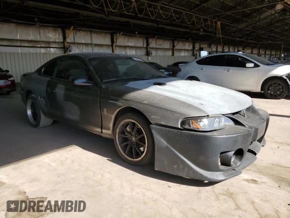 1997 Ford Mustang Cobra with VIN 1FALP47V8VF103811, listed as a Copart auction lot 56455324 with 129,499 mi miles and Salvage Title. Bid and sale history available at carsss.com. Image 4.