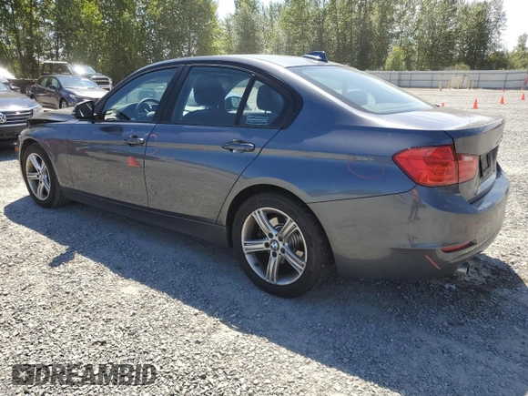 2014 BMW 3 Series 320i with VIN WBA3B1C54EK132952, listed as a Copart auction lot 63653435 with 63,260 mi miles and Salvage title. Bid and sale history available at DreamBid. Image 2.