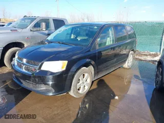 2014 Dodge Grand Caravan SXT with VIN 2C4RDGBG7ER197065, listed as a IAAI auction lot 41674441 with 233,065 mi miles. Bid and sale history available at carsss.com. Image 2.