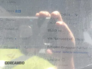 2024 Tesla Model Y Long Range z VIN 7SAYGDEEXRA236065, wystawiony jako IAAI lot #41834658 z przebiegiem 20 313 mil mil oraz . Historia ofert i sprzedaży dostępna na DreamBid. Obrazek 7.