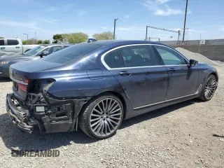 2018 BMW 7 Series 740i with VIN WBA7E2C58JG743126, listed as a Copart auction lot 53843795 with 90,614 mi miles and Salvage title. Bid and sale history available at DreamBid. Image 3.