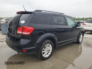 2015 Dodge Journey SXT with VIN 3C4PDDBG0FT660457, listed as a Copart auction lot 54582265 with 164,879 mi miles and Salvage title. Bid and sale history available at DreamBid. Image 3.