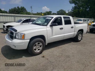 2006 Dodge Dakota SLT with VIN 1D7HE48NX6S672954, listed as a Copart auction lot 63832705 with 113,163 mi miles and Salvage title. Bid and sale history available at DreamBid. Image 1.