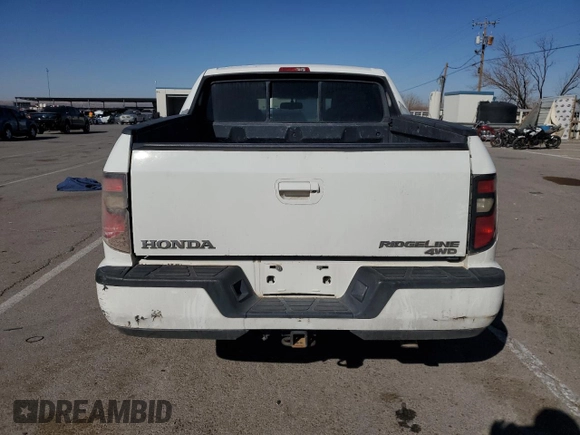 2013 Honda Ridgeline Sport с VIN 5FPYK1F71DB012602, выставлен на аукционе Copart как лот 48170135 с пробегом 117 586 миль миль и Списание • Salvage title. История ставок и продаж доступна на DreamBid. Изображение 6.