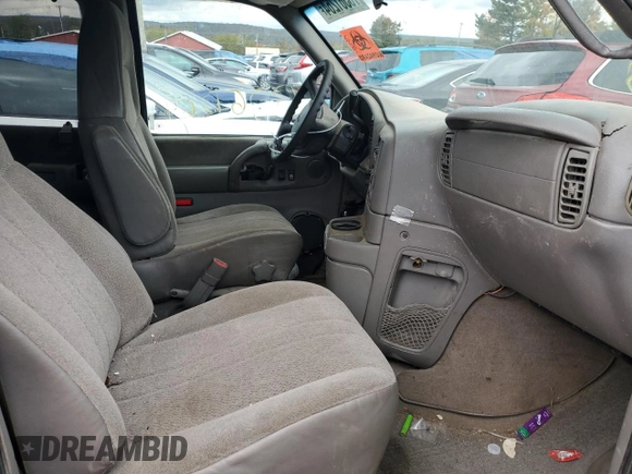 2004 Chevrolet Astro z VIN 1GNEL19X74B127199, wystawiony jako Copart lot #73361264 z przebiegiem Nie podano mil oraz Szkoda całkowita • Salvage title. Historia ofert i sprzedaży dostępna na DreamBid. Obrazek 7.