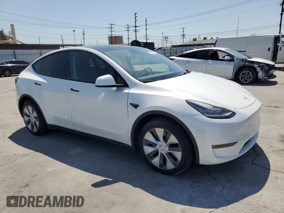 2022 Tesla Model Y Long Range z VIN 7SAYGDEE2NF513823, wystawiony jako Copart lot #51174795 z przebiegiem 28 143 mil mil oraz Szkody całkowita. Historia ofert i sprzedaży dostępna na DreamBid. Obrazek 4.