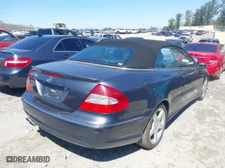 2009 Mercedes-Benz CLK-Class 3.5L with VIN WDBTK56FX9T108975, listed as a IAAI auction lot 41884199 with 121,764 mi miles. Bid and sale history available at carsss.com. Image 4.