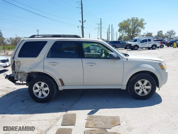 2010 Mercury Mariner with VIN 4M2CN8BG7AKJ01706, listed as a IAAI auction lot 41701667 with 96,189 mi miles. Bid and sale history available at carsss.com. Image 13.