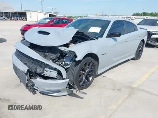 2021 Dodge Charger R/T with VIN 2C3CDXCT0MH602127, listed as a IAAI auction lot 42253925 with 31,302 mi miles and . Bid and sale history available at DreamBid. Image 2.