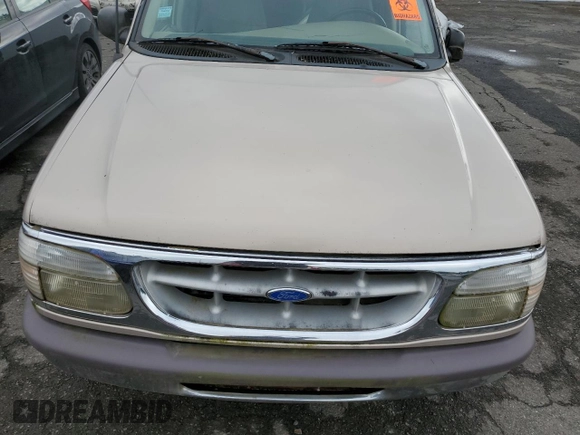 1997 Ford Explorer XLT with VIN 1FMDU35PXVZB69793, listed as a Copart auction lot 70712774 with 138,243 mi miles and Salvage title. Bid and sale history available at DreamBid. Image 11.