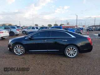 2017 Cadillac XTS Luxury with VIN 2G61M5S3XH9116856, listed as a IAAI auction lot 41893527 with 135,762 mi miles. Bid and sale history available at carsss.com. Image 14.