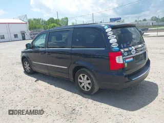 2011 Chrysler Town & Country Touring with VIN 2A4RR5DG7BR697932, listed as a IAAI auction lot 42231254 with 151,866 mi miles and . Bid and sale history available at DreamBid. Image 3.