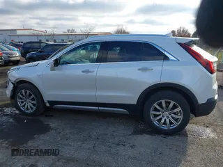 2022 Cadillac XT4 AWD Premium Luxury with VIN 1GYFZDR49NF105003, listed as a IAAI auction lot 41009382 with 43,395 mi miles and . Bid and sale history available at carsss.com. Image 14.