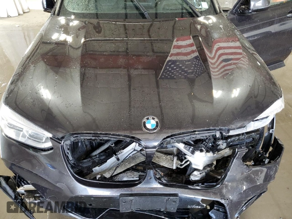 2020 BMW X4 M Competition z VIN 5YMUJ0C05L9B44115, wystawiony jako Copart lot #55556755 z przebiegiem Nie podano mil oraz Szkody całkowita. Historia ofert i sprzedaży dostępna na DreamBid. Obrazek 12.