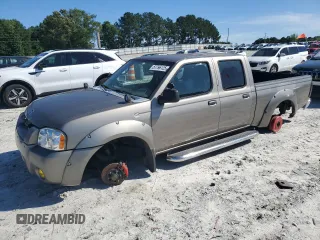 2004 Nissan Frontier XE z VIN 1N6ED29X94C473256, wystawiony jako Copart lot #57796125 z przebiegiem 306 316 mil mil oraz Czysty tytuł • Clean title. Historia ofert i sprzedaży dostępna na DreamBid. Obrazek 1.