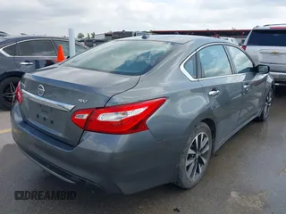 2016 Nissan Altima SV with VIN 1N4AL3AP8GC165916, listed as a IAAI auction lot 42035695 with 126,398 mi miles and . Bid and sale history available at DreamBid. Image 4.