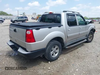 2005 Ford Explorer Sport Trac XLS z VIN 1FMZU77K55UB51889, wystawiony jako IAAI lot #42279164 z przebiegiem 210 081 mil mil oraz . Historia ofert i sprzedaży dostępna na DreamBid. Obrazek 4.