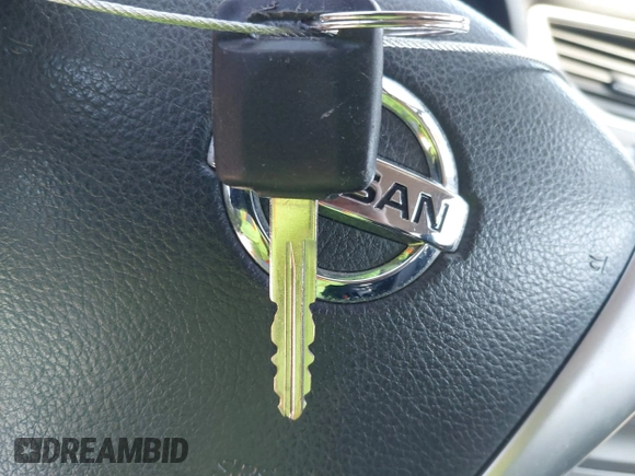 2014 Nissan Sentra S with VIN 3N1AB7AP2EY218718, listed as a IAAI auction lot 41770910 with 115,027 mi miles and . Bid and sale history available at DreamBid. Image 11.