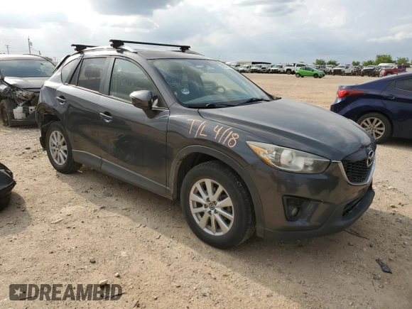 2015 Mazda CX-5 Touring with VIN JM3KE4CY0F0517821, listed as a Copart auction lot 53937195 with 165,852 mi miles and Salvage Title. Bid and sale history available at DreamBid. Image 4.
