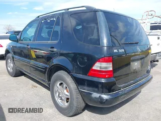 1998 Mercedes-Benz M-Class with VIN 4JGAB54E9WA019694, listed as a IAAI auction lot 41891982 with 282,454 mi miles. Bid and sale history available at carsss.com. Image 3.