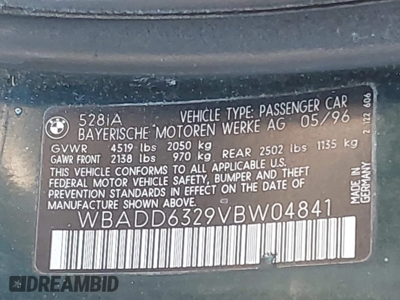 1997 BMW 5 Series 528iA with VIN WBADD6329VBW04841, listed as a IAAI auction lot 42038507 with 147,762 mi miles. Bid and sale history available at carsss.com. Image 9.