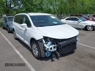 2022 Chrysler Pacifica Touring L with VIN 2C4RC1BG6NR220366, listed as a IAAI auction lot 42243985 with 31,585 mi miles and . Bid and sale history available at DreamBid. Image 1.