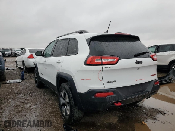 2015 Jeep Cherokee Trailhawk with VIN 1C4PJMBS9FW605075, listed as a Copart auction lot 49256195 with 103,677 mi miles and Salvage Title. Bid and sale history available at DreamBid. Image 2.