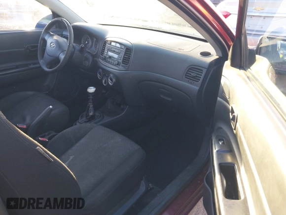 2007 Hyundai Accent SE with VIN KMHCN36C67U023704, listed as a IAAI auction lot 41631710 with 171,793 mi miles. Bid and sale history available at carsss.com. Image 5.