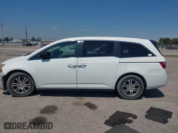 2012 Honda Odyssey EX-L with VIN 5FNRL5H61CB019215, listed as a IAAI auction lot 41837320 with 248,498 mi miles and . Bid and sale history available at DreamBid. Image 15.