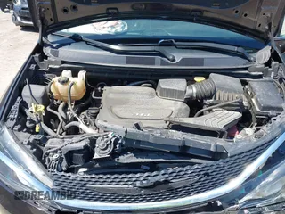 2017 Chrysler Pacifica Touring L with VIN 2C4RC1BG0HR747551, listed as a IAAI auction lot 42139664 with 120,057 mi miles and . Bid and sale history available at DreamBid. Image 10.