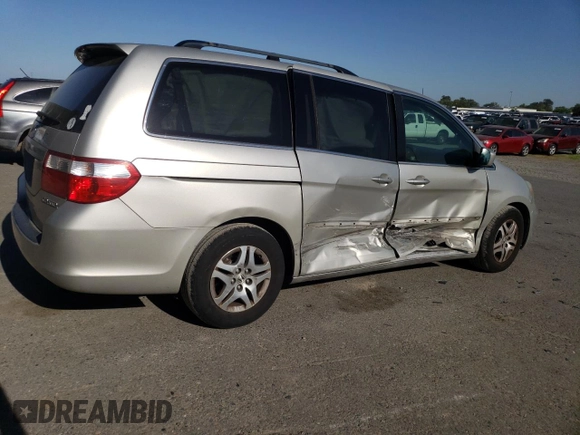 2005 Honda Odyssey EX-L with VIN 5FNRL38735B079366, listed as a Copart auction lot 53980645 with 241,156 mi miles and Salvage Title. Bid and sale history available at carsss.com. Image 3.
