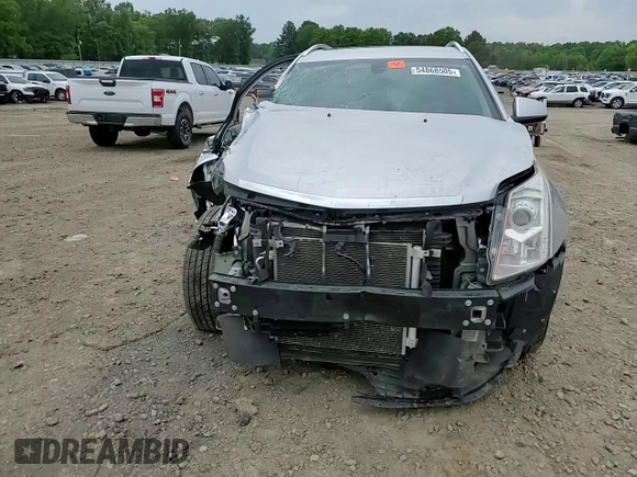 2015 Cadillac SRX Luxury Collection z VIN 3GYFNEE31FS618855, wystawiony jako Copart lot #54868505 z przebiegiem 111 612 mil mil oraz Szkoda całkowita • Salvage title. Historia ofert i sprzedaży dostępna na DreamBid. Obrazek 14.