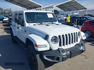 2021 Jeep Wrangler Unlimited Sahara with VIN 1C4JJXP6XMW765398, listed as a IAAI auction lot 41592185 with 26,834 mi miles and . Bid and sale history available at DreamBid. Image 1.