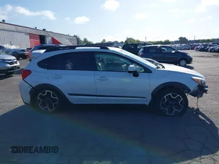 2014 Subaru Crosstrek Premium z VIN JF2GPAWC9E8209135, wystawiony jako IAAI lot #42088173 z przebiegiem 93 234 mil mil oraz . Historia ofert i sprzedaży dostępna na DreamBid. Obrazek 14.