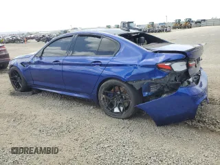2019 BMW M5 z VIN WBSJF0C58KB448366, wystawiony jako Copart lot #50417885 z przebiegiem 59 061 mil mil oraz Szkoda całkowita • Salvage title. Historia ofert i sprzedaży dostępna na DreamBid. Obrazek 2.
