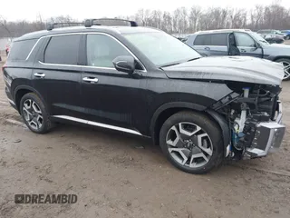 2023 Hyundai Palisade Ultimate Calligraphy z VIN KM8R5DGE7PU523001, wystawiony jako IAAI lot #41439902 z przebiegiem 46 061 mil mil oraz . Historia ofert i sprzedaży dostępna na DreamBid. Obrazek 1.