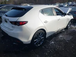 2020 Mazda 3 Preferred with VIN JM1BPBMM0L1157345, listed as a IAAI auction lot 41332440 with 64,730 mi miles and . Bid and sale history available at DreamBid. Image 4.