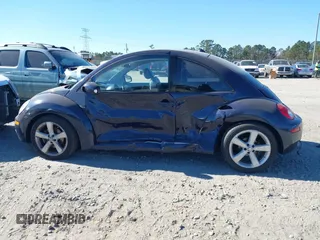 2006 Volkswagen New Beetle Coupe with VIN 3VWSW31C76M418768, listed as a IAAI auction lot 41282506 with 1 mi miles. Bid and sale history available at carsss.com. Image 14.