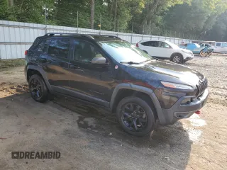 2015 Jeep Cherokee Trailhawk z VIN 1C4PJMBS6FW652001, wystawiony jako Copart lot #62344785 z przebiegiem 165 473 mil mil oraz Szkoda całkowita • Salvage title. Historia ofert i sprzedaży dostępna na DreamBid. Obrazek 4.