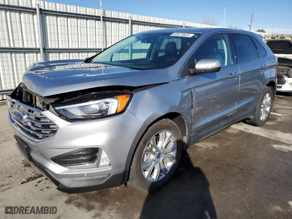 2022 Ford Edge Titanium with VIN 2FMPK4K97NBA54411, listed as a Copart auction lot 83673624 with 59,016 mi miles and Salvage Title. Bid and sale history available at carsss.com. Image 1.